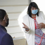 
              Doris Devine, Queens-Magnolia Terrace Subdivision President, addresses EPA Administrator Michael Regan, about how the city's water problems affects many neighborhoods, Monday, Nov. 15, 2021. Regan and others toured the school, as part of the agency's "Journey to Justice" tour through Mississippi, Louisiana and Texas, spotlighting longstanding environmental concerns in historically marginalized communities. (AP Photo/Rogelio V. Solis)
            