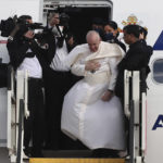 
              Pope Francis boards an aircraft departing from Eleftherios Venizelos International Airport in Athens, Greece, Monday, Dec. 6, 2021. Francis' five-day trip to Cyprus and Greece has been dominated by the migrant issue and Francis' call for European countries to stop building walls, stoking fears and shutting out "those in greater need who knock at our door." (AP Photo/Yorgos Karahalis)
            