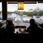 
              FILE - Customers sit in a booth at the Penrose Diner, Tuesday, Nov. 17, 2020, in south Philadelphia. Philadelphia officials announced Monday, Dec. 13, 2021 that proof of vaccination will be required starting Jan. 3 for bars, restaurants, indoor sporting events, movie theaters and other places where people eat indoors close to each other. (AP Photo/Matt Slocum, File)
            