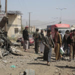 
              FILE - People inspect the site of an airstrike by Saudi-led coalition in Sanaa, Yemen, on Nov, 11, 2021. The United Nations is predicting that a record 274 million people – who together would amount to the world’s fourth most-populous country – will require emergency humanitarian aid next year in countries including Afghanistan, Ethiopia, Myanmar, Syria and Yemen as they face a raft of challenges such as war, insecurity, hunger, climate change and the coronavirus pandemic. (AP Photo/Hani Mohammed)
            