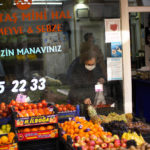 
              A woman picks up tomatoes in a food shop in Istanbul, Turkey, Thursday, Dec. 2, 2021. Turkey’s beleaguered currency has been plunging to all-time lows against the U.S. dollar and the euro in recent months as President Recep Tayyip Erdogan presses ahead with a widely criticized effort to cut interest rates despite surging consumer prices. (AP Photo/Francisco Seco)
            