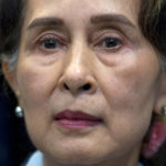 
              FILE - Myanmar's leader Aung San Suu Kyi waits to address judges of the International Court of Justice on the second day of three days of hearings in The Hague, Netherlands on Dec. 11, 2019. Myanmar court on Monday, Dec. 6, 2021, sentenced ousted leader Suu Kyi to 4 years for incitement and breaking virus restrictions, then later in the day state TV announced that the country's military leader reduced the  sentence by two years. (AP Photo/Peter Dejong, File)
            