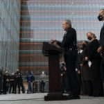 
              Los Angeles Police Chief Michel Moore, center, speaks during a news conference as he is joined by Mayor Eric Garcetti, second from right, outside the Los Angeles Police Headquarters Thursday, Dec. 2, 2021, in Los Angeles. Authorities in Los Angeles on Thursday announced arrests in recent smash-and-grab thefts at stores, part of a rash of organized retail crime in California. (AP Photo/Jae C. Hong)
            