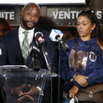 
              Sean Walton, left, attorney representing Tamala Payne, right, the mother of Casey Goodson Jr., speaks during a news conference Thursday, Dec. 2, 2021, in Columbus, Ohio about the indictment of a former deputy who shot and killed her son.  Jason Mead, the Ohio sheriff's deputy who fatally shot Casey Goodson Jr. in the back five times has been charged with murder and reckless homicide. (AP Photo/Jay LaPrete)
            