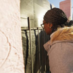 
              A sidewalk counselor calls out through the masked iron fencing to a patient of the Jackson Women's Health Organization, a state-licensed abortion clinic, as she enters the facility, in Jackson, Miss., Wednesday, Dec. 1, 2021. A small group of anti-abortion activists stood outside the clinic in an effort to dissuade patients from entering. On Wednesday, the U.S. Supreme Court hears a case that directly challenges the constitutional right to an abortion established nearly 50 years ago. (AP Photo/Rogelio V. Solis)
            