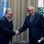 
              Lebanese Foreign Minister Abdallah Bouhabib, right, shakes hand with United Nations Secretary-General Antonio Guterres, upon his arrival at the Rafik Hariri International Airport in Beirut, Lebanon, Sunday, Dec. 19, 2021. (AP Photo/Hassan Ammar)
            