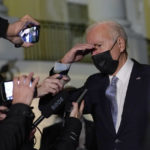 
              President Joe Biden talks with reporters at the White House in Washington, Friday, Dec. 3, 2021, as he prepares to leave for Camp David. (AP Photo/Susan Walsh)
            