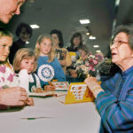 
              FILE - Beverly Cleary signs books at the Monterey Bay Book Festival in Monterey, Calif., April 19, 1998. Cleary, who died March 25, 2021, channeled memories from her youth in Oregon to created beloved characters such as Ramona Quimby, her sister Beatrice “Beezus” Quimby and Henry Huggins. (Vern Fisher/Monterey Herald via AP, File)
            