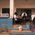 
              Electoral workers prepare the ballot drums at a polling station in Bakau, Gambia, Saturday, Dec. 4, 2021. Gambians vote in a historic election that will for the first time not have former dictator Yahya Jammeh, who ruled for 22 years, on the ballot. (AP Photo/Leo Correa)
            