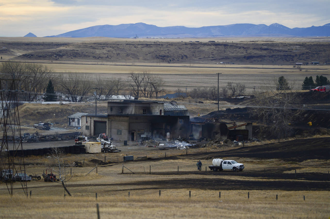 A fire burned through the Gibson Flats area south of Great Falls, Mont., on Wednesday, Dec. 1, 2021...