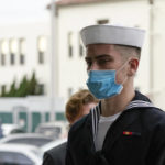 
              Navy Seaman Apprentice Ryan Sawyer Mays arrives for a hearing at Naval Base San Diego Monday, Dec. 13, 2021, in San Diego. The Navy is set to hold a hearing to review whether there is enough evidence to order a court martial for a San Diego-based sailor charged with setting the fire that destroyed the USS Bonhomme Richard in the summer of 2020. (AP Photo/Gregory Bull)
            