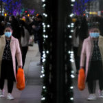 
              Shoppers are reflected in a window as they walk down Oxford Street, Europe's busiest shopping street, in London, Thursday, Dec. 23, 2021. (AP Photo/Frank Augstein)
            