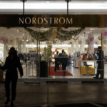 
              A security guard, right, stands at the entrance to a Nordstrom department store at the Grove mall in Los Angeles, Thursday, Dec. 2, 2021, where a recent smash-and-grab robbery took place.  Prosecutors and retailers are pushing back on assertions by California’s governor and attorney general that they have enough tools to combat shoplifting. California Retailers Association president Rachel Michelin says shoplifting has been a growing problem.(AP Photo/Jae C. Hong)
            