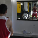 
              A member of the Afghan national boxing team trains during a session in local gym in Serbia, Wednesday, Dec. 1, 2021. They practiced in secrecy and sneaked out of Afghanistan to be able to compete at an international championship. Now, the Afghan boxing team are seeking refuge in the West to be able to continue both their careers and lives without danger or fear. (AP Photo/Darko Vojinovic)
            