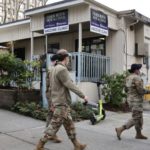 National Guard members arrive to Harborview Medical Center in Seattle on Friday, Jan. 21, 2022. (Getty Images)