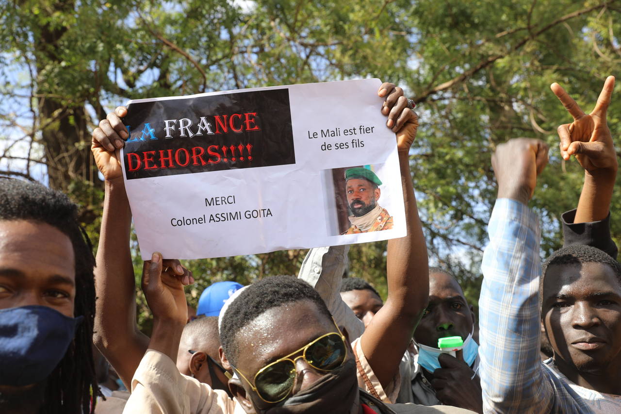 Thousands join a government-sponsored rally in Mali's capital Bamako Friday Jan. 14, 2021 to protes...