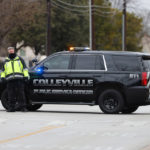 
              CORRECTS BYLINE TO ELIAS VALVERDE INSTEAD OF LYNDA M. GONZALEZ - A police officer blocks a street near Congregation Beth Israel in Colleyville, Texas on Saturday afternoon, Jan. 15, 2022. Authorities said a man took hostages Saturday during services at the synagogue where the suspect could be heard ranting in a livestream and demanding the release of a Pakistani neuroscientist who was convicted of trying to kill U.S. Army officers in Afghanistan. (Elias Valverde/The Dallas Morning News via AP)
            