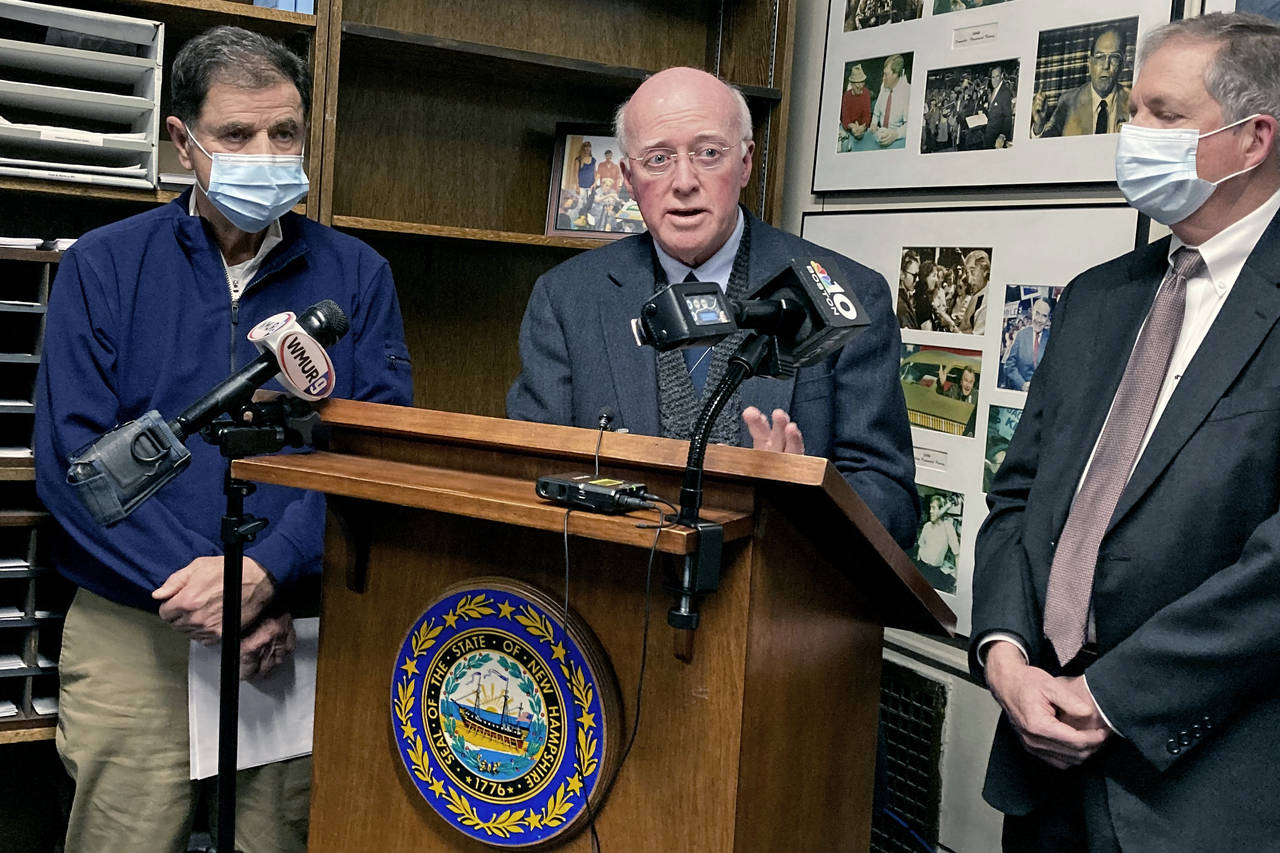 New Hampshire Secretary of State Bill Gardner, center, announces he will step down from office duri...