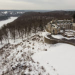 
              FILE - The Seven Springs, a property owned by former U.S. President Donald Trump, is covered in snow, Tuesday, Feb. 23, 2021, in Mount Kisco, N.Y.  The New York attorney general, Tuesday, Jan. 18, 2022, says her investigators have uncovered evidence that former President Donald Trump's company used "fraudulent or misleading" valuations of its golf clubs, skyscrapers and other property to get loans and tax benefits. (AP Photo/John Minchillo, File)
            