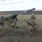 
              In this image taken from footage provided by the Ukrainian Defense Ministry Press Service, a Ukrainian soldiers use a launcher with US Javelin missiles during military exercises in Donetsk region, Ukraine, Wednesday, Jan. 12, 2022. President Joe Biden has warned Russia's Vladimir Putin that the U.S. could impose new sanctions against Russia if it takes further military action against Ukraine. (Ukrainian Defense Ministry Press Service via AP)
            