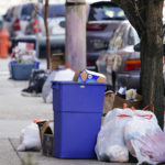 
              Trash sits on the sidewalk in Philadelphia, Thursday, Jan. 13, 2022. The omicron variant is sickening so many sanitation workers around the U.S. that waste collection in Philadelphia and other cities has been delayed or suspended. (AP Photo/Matt Rourke)
            