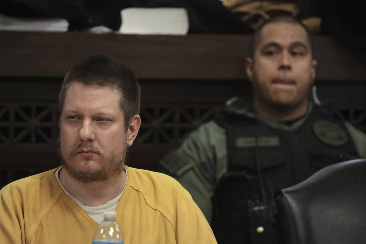 FILE - In this Jan. 18, 2019 file photo, former Chicago police Officer Jason Van Dyke, left, attend...