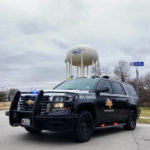 
              A Texas state trooper blocks traffic on a road leading to a Colleyville, Texas, synagogue where a man apparently took hostages, Saturday, Jan. 15, 2022. (AP Photo/Jake Bleiberg)
            