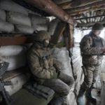 
              Ukrainian servicemen rest in a shelter on the front line in the Luhansk region, eastern Ukraine, Friday, Jan. 28, 2022. High-stakes diplomacy continued on Friday in a bid to avert a war in Eastern Europe. The urgent efforts come as 100,000 Russian troops are massed near Ukraine's border and the Biden administration worries that Russian President Vladimir Putin will mount some sort of invasion within weeks. (AP Photo/Vadim Ghirda)
            