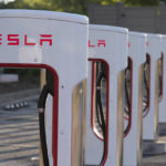 
              FILE - A Tesla Supercharger station in Buford, Ga, on April 22, 2021.  Tesla is turning to Mozambique for a key component in its electric car batteries in what analysts believe is a first-of-its-kind deal designed to reduce its dependence on China for graphite. Elon Musk’s company signed an agreement last month with Australia’s Syrah Resources, which operates one of the world’s largest graphite mines in the southern African country. (AP Photo/Chris Carlson, File)
            