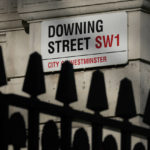 
              FILE - The street sign at Downing Street in London, Jan. 17, 2022. Fighting for his career, British Prime Minister Boris Johnson has one constant refrain: Wait for Sue Gray. Gray is a senior civil servant who may hold Johnson’s political future in her hands. She has the job of investigating allegations that the prime minister and his staff attended lockdown-flouting parties on government property. (AP Photo/Kirsty Wigglesworth, File)
            