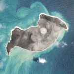 
              In this satellite photo taken by Planet Labs PBC, an island created by the underwater Hunga Tonga Hunga Ha'apai volcano is seen Jan. 3, 2022. An undersea volcano erupted in spectacular fashion near the Pacific nation of Tonga on Saturday, Jan. 15, sending large tsunami waves crashing across the shore and people rushing to higher ground. A tsunami advisory was in effect for Hawaii, Alaska and the U.S. Pacific coast, with reports of waves pushing boats up in the docks in Hawaii. (Planet Labs PBC via AP)
            