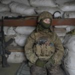 
              An Ukrainian serviceman sits in a shelter on the front line in the Luhansk region, eastern Ukraine, Friday, Jan. 28, 2022. High-stakes diplomacy continued on Friday in a bid to avert a war in Eastern Europe. The urgent efforts come as 100,000 Russian troops are massed near Ukraine's border and the Biden administration worries that Russian President Vladimir Putin will mount some sort of invasion within weeks. (AP Photo/Vadim Ghirda)
            