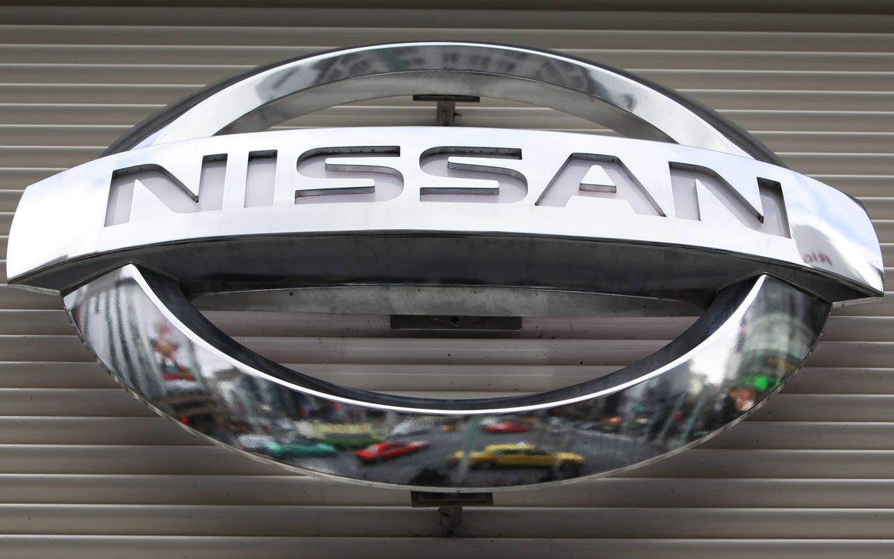 FILE - In this Wednesday, Feb. 8, 2012, file photo,  the logo of the Nissan Motors Co. is shown a s...