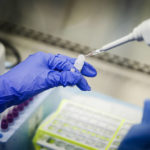 
              FILE - A laboratory technician prepares COVID-19 patient samples for semi-automatic testing at Northwell Health Labs, March 11, 2020, in Lake Success, N.Y. Republicans' faith in science is falling as Democrats rely on it even more with a trust gap in science and medicine widening substantially during the COVID-19 pandemic, new survey data shows. It’s the largest gap in nearly five decades of polling by the General Social Survey, a widely respected trend survey conducted by NORC at the University of Chicago that has been measuring confidence in institutions since 1972. (AP Photo/John Minchillo, File)
            