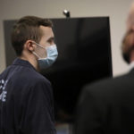 
              Mark Gooch walks past Ammon Barker chief deputy county attorney Wednesday, Jan. 19, 2022, at Coconino County Superior Court, in Flagstaff, Ariz., as he leaves court to begin a life sentence for the January 2020 kidnapping and first degree murder of Mennonite school teacher Sasha Krause. (Jake Bacon/Arizona Daily Star via AP)
            