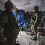 
              Ukrainian soldiers in a trench shelter on the line of separation from pro-Russian rebels, Mariupol, Donetsk region, Ukraine, Friday, Jan. 21, 2022. Blinken said the U.S. would be open to a meeting between Putin and U.S. President Joe Biden, if it would be “useful and productive.” The two have met once in person in Geneva and have had several virtual conversations on Ukraine that have proven largely inconclusive. Washington and its allies have repeatedly promised consequences such as biting economic sanctions against Russia — though not military action — if it invades. (AP Photo/Andriy Dubchak)
            