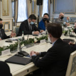 
              Ukrainian President Volodymyr Zelensky, left, sits at a table with United States Secretary of State Antony Blinken, right, on the occasion of their meeting at the Bankova, in Kyiv, Ukraine, Wednesday, Jan. 19, 2022, in Kyiv, Ukraine. (AP Photo/Alex Brandon, Pool)
            