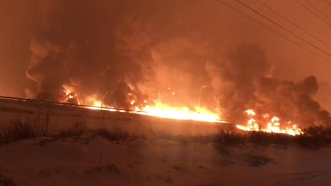 In this screenshot taken from a video, smoke rises from an oil pipeline near the town of Pazarcik i...