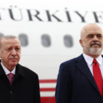 
              Albanian Prime Minister Edi Rama, right, welcomes the Turkish President Recep Tayyip Erdogan at Tirana International Airport "Mother Teresa", Albania, Monday, Jan. 17, 2022. Turkish President Recep Tayyip Erdogan visits Albania to talk with Prime Minister Edi Rama on strengthening bilateral ties. Erdogan also visits a northwestern town of Lac where Turkey has funded the building of some 500 apartments destroyed by the 2019 earthquake in the tiny Western Balkan country. (AP Photo/Franc Zhurda)
            