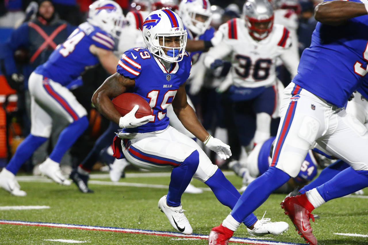 FILE - Buffalo Bills wide receiver Isaiah McKenzie (19) carries the ball during the second half of ...