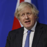 
              FILE - Britain's Prime Minister Boris Johnson speaks during a media briefing on COVID-19, in Downing Street, London, Dec. 15, 2021. Fighting for his career, British Prime Minister Boris Johnson has one constant refrain: Wait for Sue Gray. Gray is a senior civil servant who may hold Johnson’s political future in her hands. She has the job of investigating allegations that the prime minister and his staff attended lockdown-flouting parties on government property. (Tolga Akmen/Pool via AP, File)
            