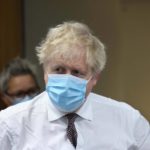 
              Britain's Prime Minister Boris Johnson looks on during a visit to Finchley Memorial Hospital, in North London, Tuesday, Jan. 18, 2022. (Ian Vogler, Pool Photo via AP)
            