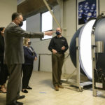 
              FILE - Doug Emhoff, husband of Vice President Kamala Harris, left, stands with Small Business Administration assistant administrator Natalie Madeira Cofield, left, and Rep. Susan Wild, D-Pa., center, as they listen to Mike Grather, center, president of Lightlab International, demonstrate equipment during a tour of the Bridgeworks Enterprise Center, a small business incubator, Wednesday, May 5 ,2021 in Allentown, Pa. (Ed Jones/ Pool via AP, File)
            