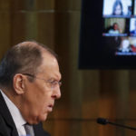 
              Russian Foreign Minister Sergey Lavrov attends his annual news conference in Moscow, Russia, Friday, Jan. 14, 2022. (Maxim Shipenkov/Pool Photo via AP)
            