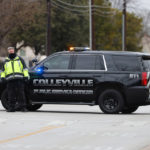 
              A police officer blocks a street near Congregation Beth Israel in Colleyville, Texas on Saturday afternoon, Jan. 15, 2022. Authorities said a man took hostages Saturday during services at the synagogue where the suspect could be heard ranting in a livestream and demanding the release of a Pakistani neuroscientist who was convicted of trying to kill U.S. Army officers in Afghanistan. (Lynda M. Gonzalez/The Dallas Morning News via AP)
            