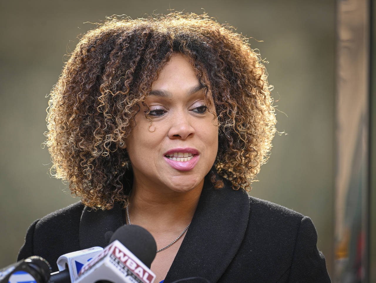 Baltimore State’s Attorney Marilyn Mosby addresses the media outside her office on a day after he...