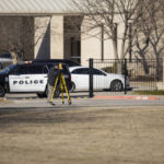 
              Law enforcement process the scene in front of the Congregation Beth Israel synagogue, Sunday, Jan. 16, 2022, in Colleyville, Texas. A man held hostages for more than 10 hours Saturday inside the temple. The hostages were able to escape and the hostage taker was killed. FBI Special Agent in Charge Matt DeSarno said a team would investigate "the shooting incident." (AP Photo/Brandon Wade)
            