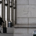 
              A hand-drawn swastika is seen on the front of Union Station near the Capitol in Washington, Friday, Jan. 28, 2022. (AP Photo/J. Scott Applewhite)
            