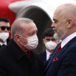 
              Albanian Prime Minister Edi Rama, right, welcomes the Turkish President Recep Tayyip Erdogan at Tirana International Airport "Mother Teresa", Albania, Monday, Jan. 17, 2022. Turkish President Recep Tayyip Erdogan visits Albania to talk with Prime Minister Edi Rama on strengthening bilateral ties. Erdogan also visits a northwestern town of Lac where Turkey has funded the building of some 500 apartments destroyed by the 2019 earthquake in the tiny Western Balkan country. (AP Photo/Franc Zhurda)
            