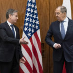 
              US Secretary of State Antony Blinken, left, greets Russian Foreign Minister Sergey Lavrov before their meeting, in Geneva, Switzerland, Friday, Jan. 21, 2022. (AP Photo/Alex Brandon, Pool)
            